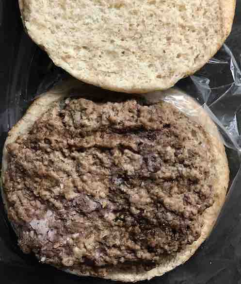 meat patty on whole-wheat bun