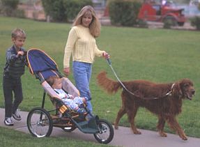 woman with dog and 2 boys